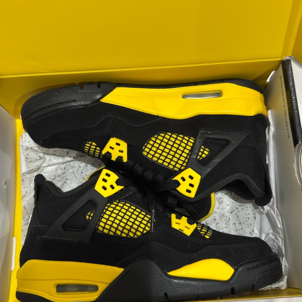Air Jordan retro 4’s Black and Yellow Boys' Sneakers